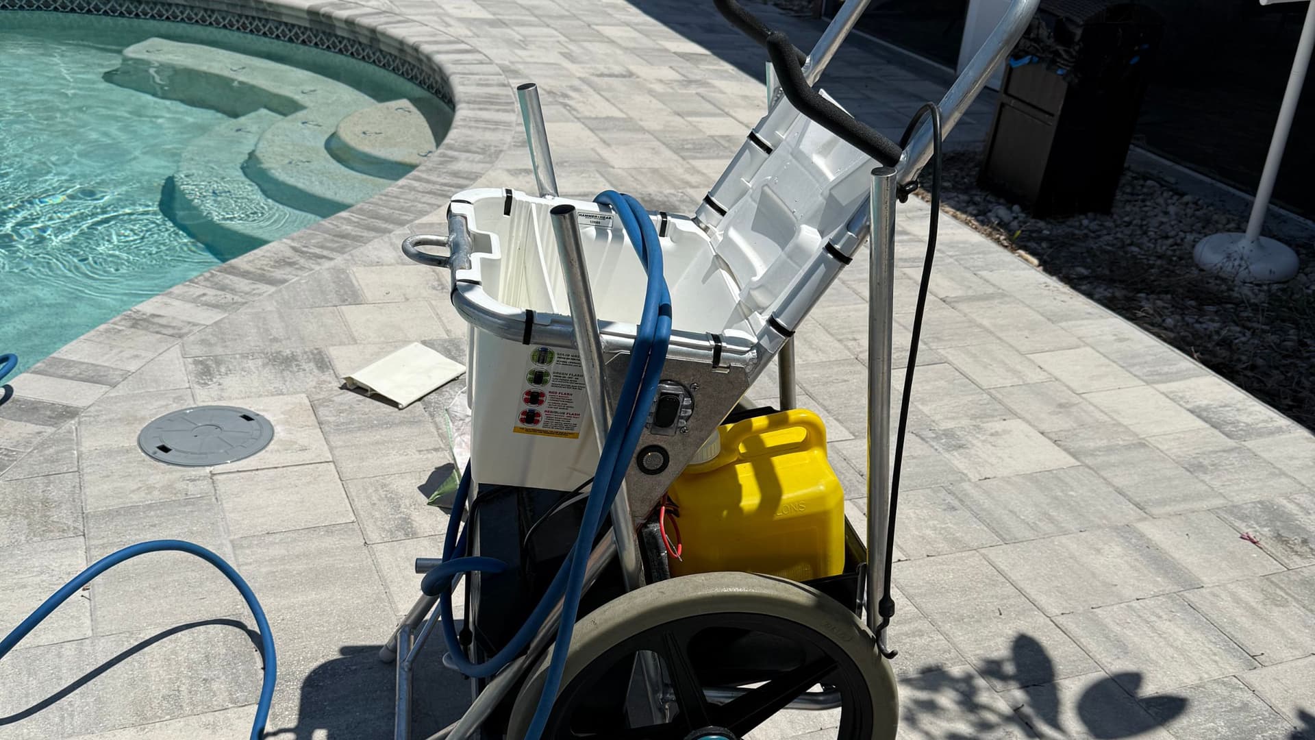 Professional pool service equipment cart with vacuum system and maintenance tools